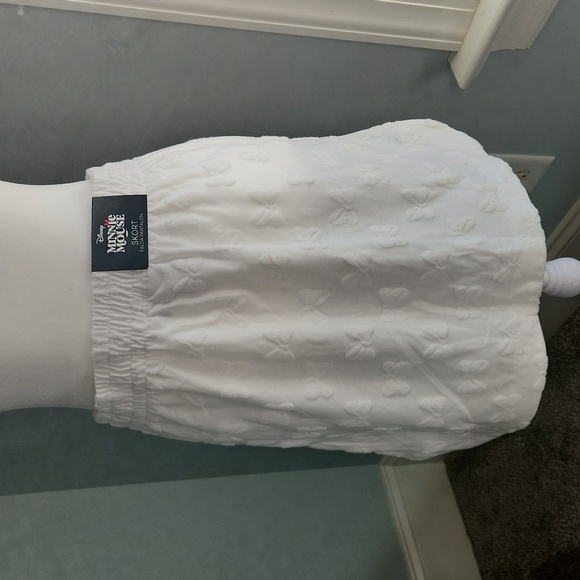 Disney Dresses & Skirts - NWT Disney Ivory Mini Skirt with Bow Motif For Minnie Mouse